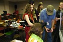 ORC offical Ron Barron showing "steam punk girl" how to drive house robot