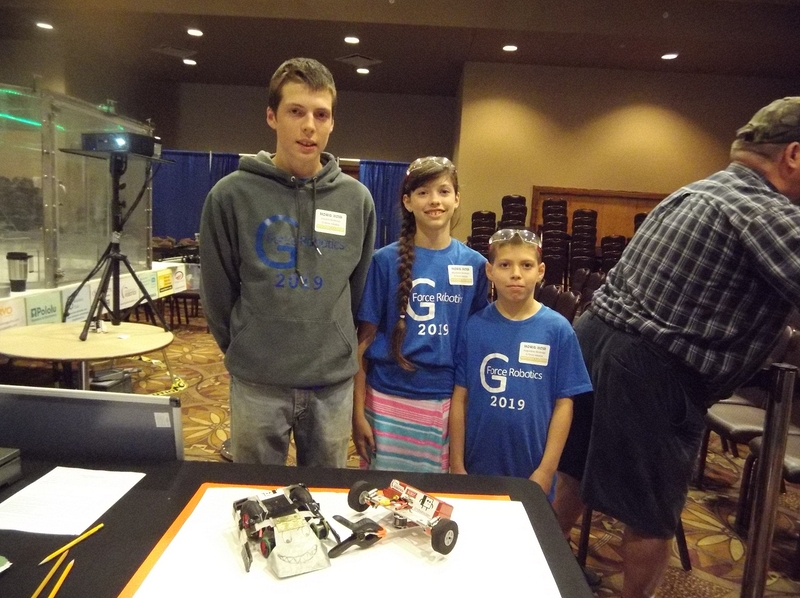 Team G Force Robotics with\nAnt Weights Scar Jr. and Scar.